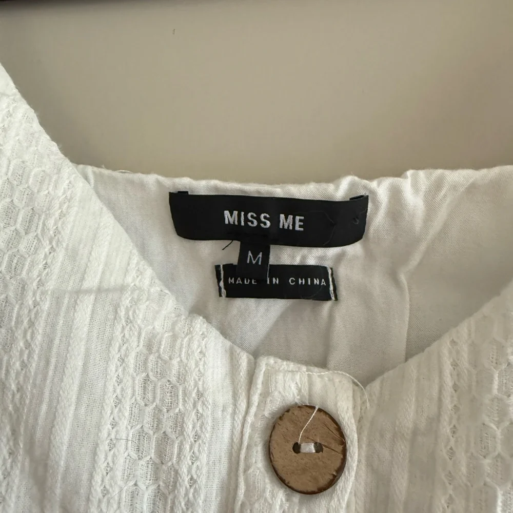 Miss Me White Buttoned Peplum Camisole - Picture 2 of 4